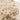 Close-up of a beige shaggy rug with a soft texture.