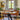 midcentury Tratten conical pendant over a dining table
