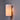 Wall-mounted soft white light fixture with a cylindrical shade on a gray wall