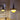 PH 3.5_3 Metal Pendant Yellow Aluminum Copper Louis Poulsen lifestyle lit Two Enighten.jpg