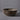 earthgender sunburst etching detail ceramic planter cressey maxwell on grey background