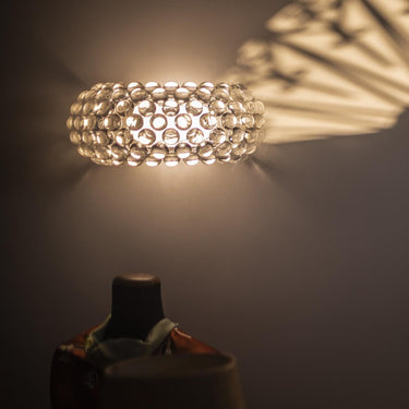Caboche Plus Wall Light for Foscarini lit medium transparent.jpg