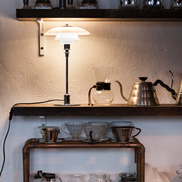 Poul Henningsen PH 2/11 Opal Glass Table Lamp Louis Poulsen Two Enlighten Chrome coffee bar lifestyle 