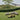Tradition Collection for Fritz Hansen outdoor seating configuration by a lake.jpg