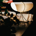 auboeck nun table lamp lit side view.jpg