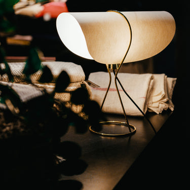 auboeck nun table lamp lit side view.jpg