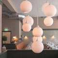 Wilhelm Wohlert Satellite Pendant lifestyle Louis Poulsen.jpg