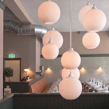 Wilhelm Wohlert Satellite Pendant lifestyle Louis Poulsen.jpg