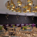 beat pendants brass tom dixon installation