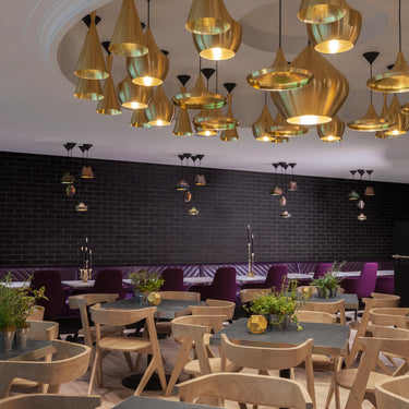 beat pendants brass tom dixon installation