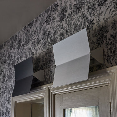 perriand pivotant plie in black and white in bathroom two enlighten