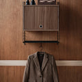 walnut string furniture cabinet with flip door two enlighten wall installation.webp