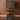 walnut string furniture cabinet with flip door two enlighten wall installation.webp