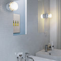 Joe Colombo Fresnel wall lamp in white indoors lit Oluce Two Enlighten Los Angeles