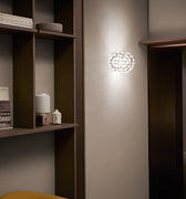 Caboche Plus Wall Light for Foscarini transparent small lit.jpg