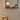 the_muse_in_pleasure_garden_green_on_shelf_mirror_reflection_hallway_lifestyle_2048x2048_3