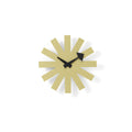 Modern wall clock with gold sunburst design on a white background