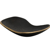 Black wavy catchall dish on a white background
