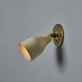 V3429 oluce white and brass wall light ostuni lit
