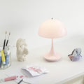 5744612830 Panthella 160 Poulsen Opal Pale Rose lit desk lamp