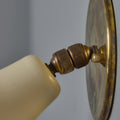 V3429 oluce white and brass wall light ostuni ball joint detail