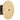 Round brass object with engraved design on a white background