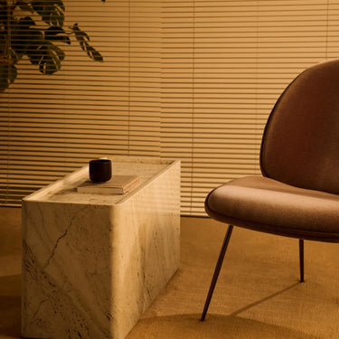 Pietra side table lifestyle gamfratesi for gubi rectangle.webp
