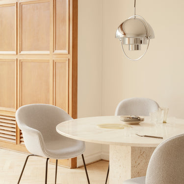 Travertine Dining Table by GamFratesi for GUBI GUBI Home_Moments_1pm_V2.jpg