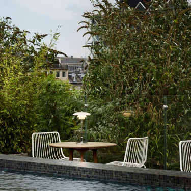 PH 2/1 portable chrome table lamp louis poulsen poul henningsen two enlighten poolside lifestyle 