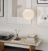 Patera pendant by Oivind Slaato for Louis Poulsen desk lifestyle.jpg