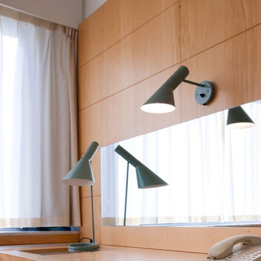 AJ Wall lamp pale petroleum  lifestyle Arne Jacobsen Louis Poulsen.jpg