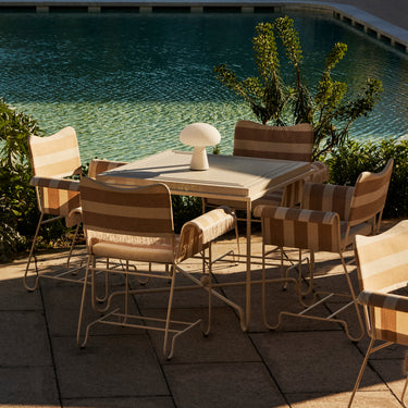 Mategot Tropique Dining Table for Gubi GUBI_MILAN_23_0119_POOLSIDE.jpg