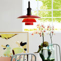 PH 3.5_3 Metal Pendant Red Aluminum Copper Louis Poulsen lifestyle lit Two Enighten.jpg