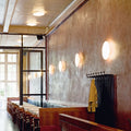 Arne Jacobsen AJ Eklipta Wall and ceiling lifestyle restaurant Louis Poulsen .webp