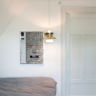 Doo Wop Pendant Louis Poulsen brass Lifestyle lit.jpg