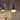 PH 3.5_3 Metal Pendant Yellow Aluminum Copper Louis Poulsen lifestyle lit Two Enighten.jpg