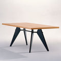 Wooden table with black metal legs on a white background