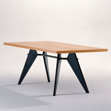 Wooden table with black metal legs on a white background
