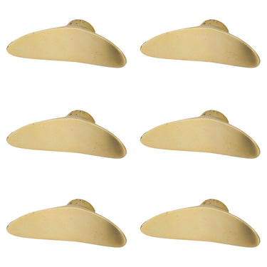 Set of six brass drawer pulls on a white background