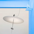 Flying Disc Suspension Lamp Ingo Maurer two enlighten room.jpg
