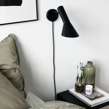 Arne Jacobsen 'AJ Wall' Indoor Light for Louis Poulsen Two Enlighten black with cord bedside lifestyle 
