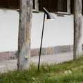 AJ Garden modern outdoor pathway light on grass with a building in the background