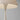 White mushroom-shaped lamp on a gray background