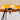 Close-up of a lamp with wooden base and metal legs on a plain background