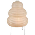 Decorative cloud shaped Akari 24N lamp with layered washi paper design on a white background