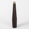 Tapered brass vase on a white background