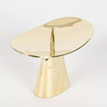 brass midcentury candleholders unique design on a white background