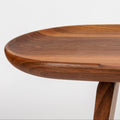 walnut side low table with a smooth surface on a white background