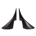Pair of dark brass bookends on a white background