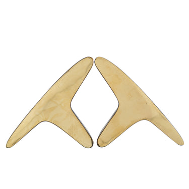 Pair of brass bookends by carl aubock on a white background